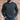 View of Filson Men's Waffle Knit Henley in Faded Black, Mossy Rock, and Sand, featuring a 2-button placket and rib-knit collar and cuffs
