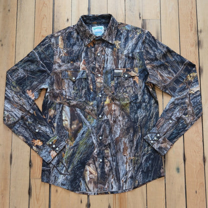 Sendero Confluence Tech Long Sleeve Shirt in Will Tree Camo featuring classic pearl snaps and a tailored western fit.