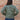 View of Schaefer ladies moss waxed canvas jacket with antique brass snaps and six pockets