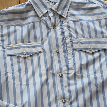 View of Schaefer blue stripe Western snap shirt with mesh-back vent and chest pockets