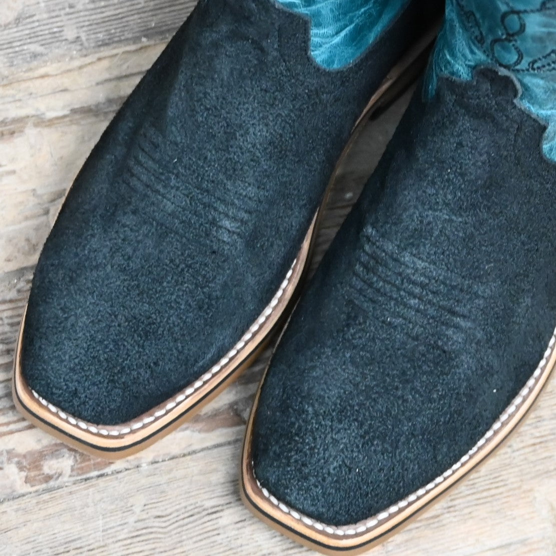 View of Horse Power 11&quot; boot with black suede vamp, blue volcano shank and top, cutter toe, and pull holes