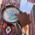 View of Smithey Ironware Perfect Pair Set: No. 12 Cast Iron Skillet and 12" Carbon Steel Farmhouse Skillet with full grain leather sleeve and potholder