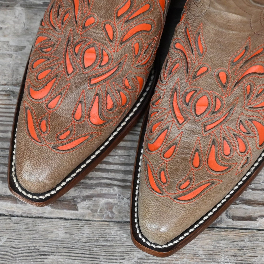 View of Hondo 13&quot; cowboy boot in brown vintage goat with orange inlays and snip toe