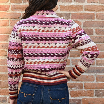 View of Filson Ladies Fair Isle Cardigan in Burgundy/Cream/Mauve featuring Western motifs and vertical-entry front pockets