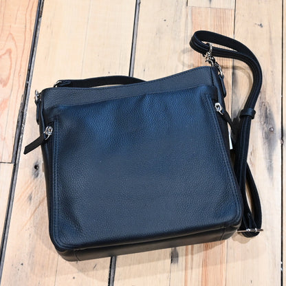 Gun Toten Mamas conceal carry Slim Cross-Body bag in cinnamon leather with black trim