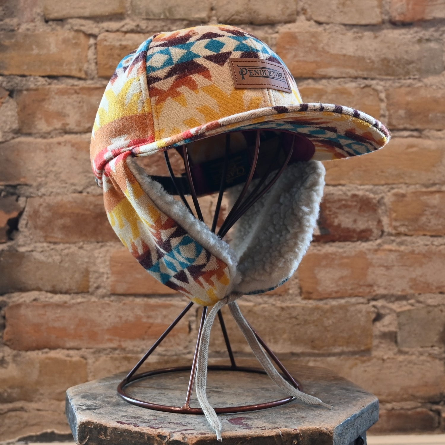 View of Pendleton Timberline wool cap in Pasco pattern with sherpa ear flaps and tie closure