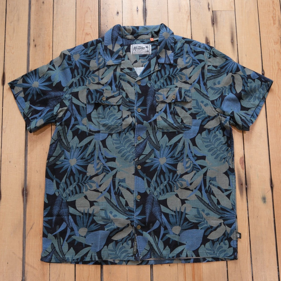 Howler Bros Shores Club Shirt in Tropical Dimension: Antique Black laid flat.