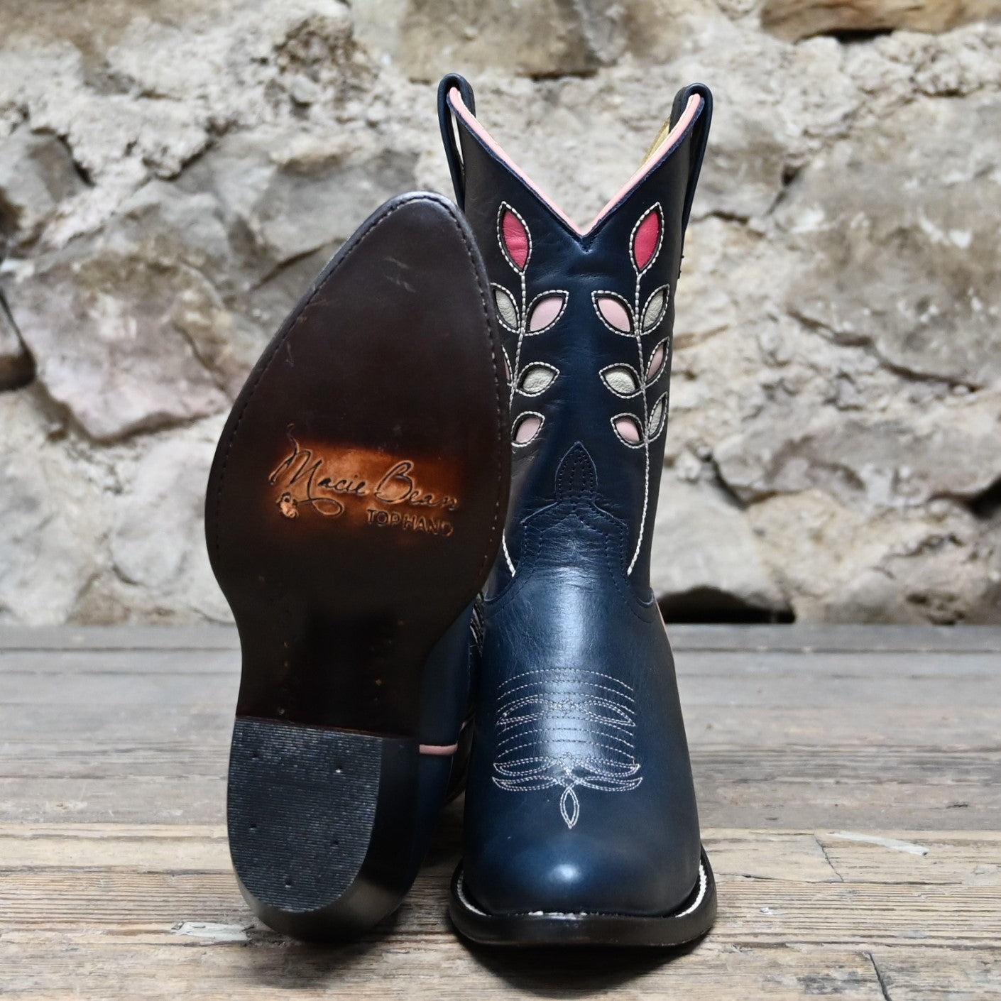 View of Macie Bean 10″ boot with navy glazed cowhide, berry inlays, almond toe, and cowgirl heel