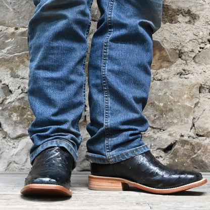 View of Hyer JETMORE 13&quot; boots showcasing black full-quill ostrich vamp and red vintage goat upper with broad square toe and Stockman block heel