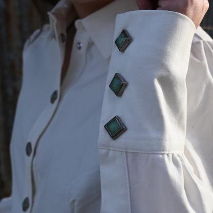 View of Blue Blanket ladies white Western cotton shirt with turquoise gem snaps and yoke detailing