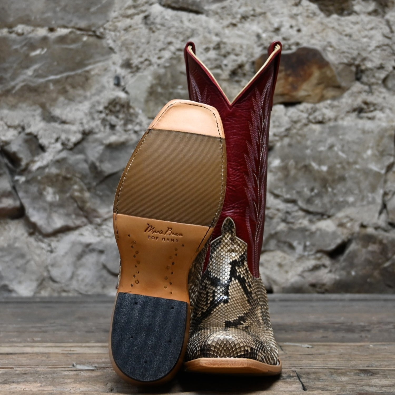 View of Macie Bean 13″ boot with red Station shaft, mink python vamp, and cutter toe