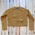 View of Pendleton cropped lambswool sweater in Deep Gold with cable knit pattern