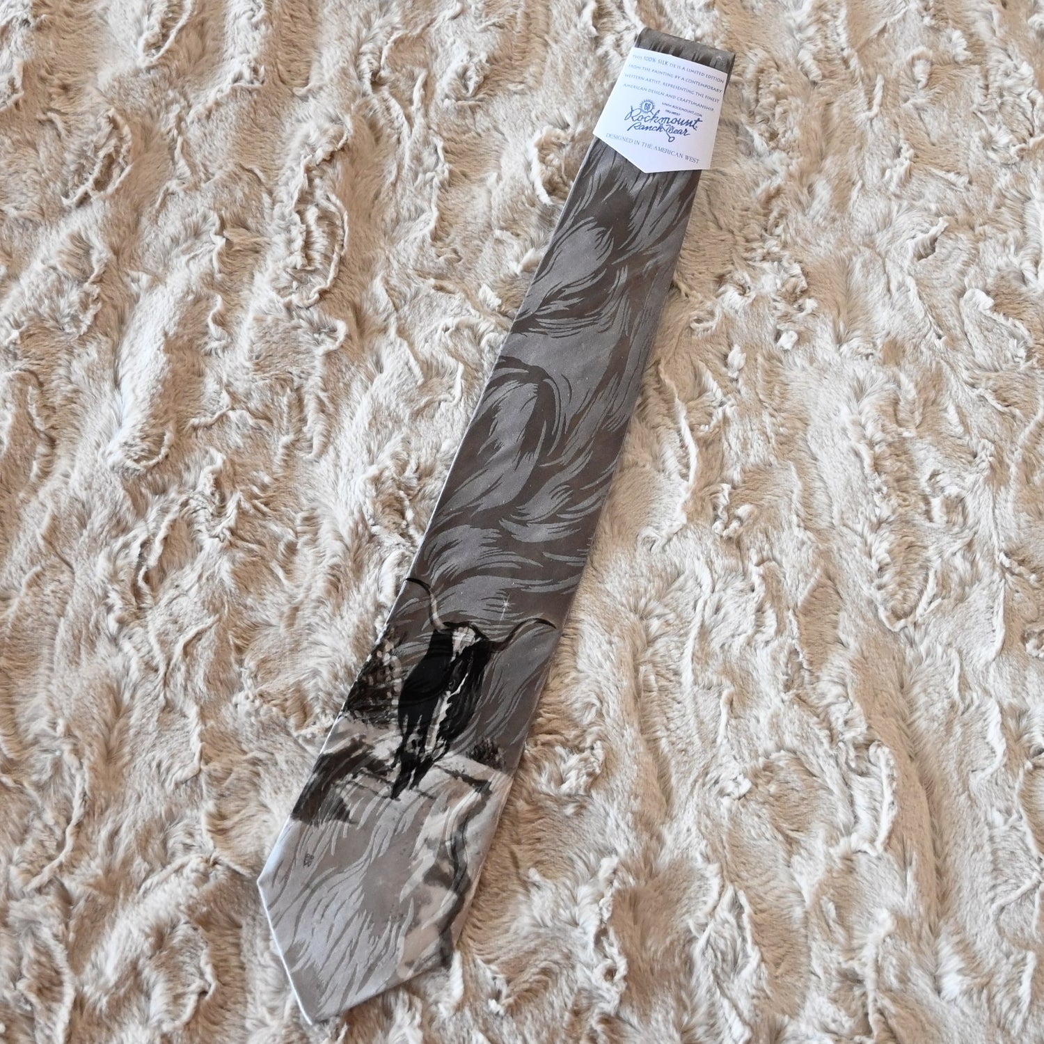 View of Rockmount silk necktie with lone longhorn steer head design