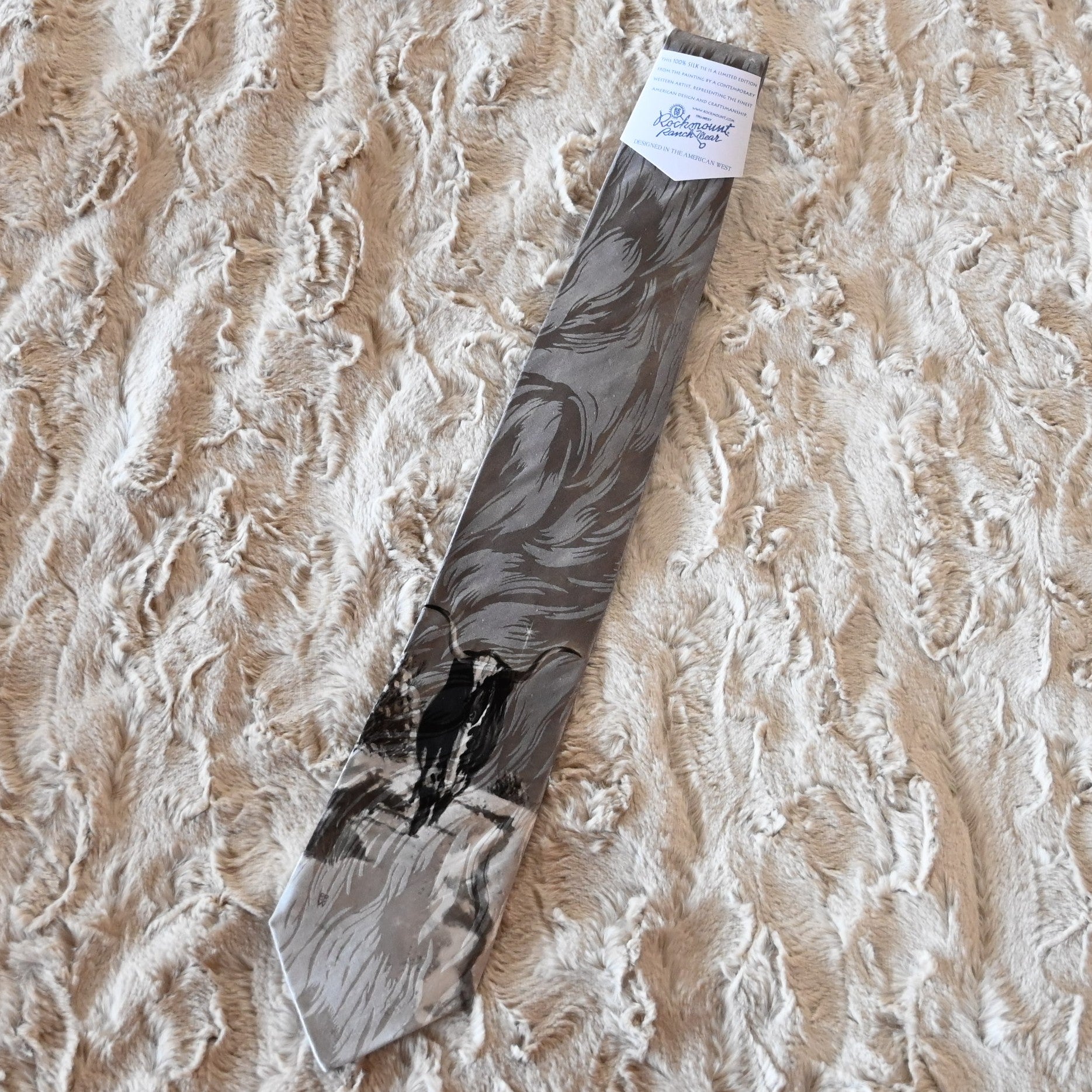 View of Rockmount silk necktie with lone longhorn steer head design