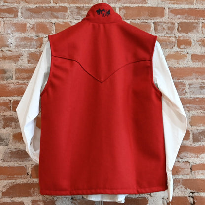 View of Schaefer ladies wool Arena vest in black or red with Western yokes and storm-flap zip front