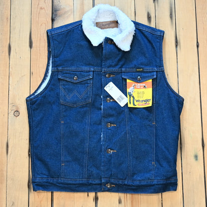 View of Wrangler Sherpa Lined Denim Vest in Prewashed featuring sherpa lining, spread collar, and button-front closure