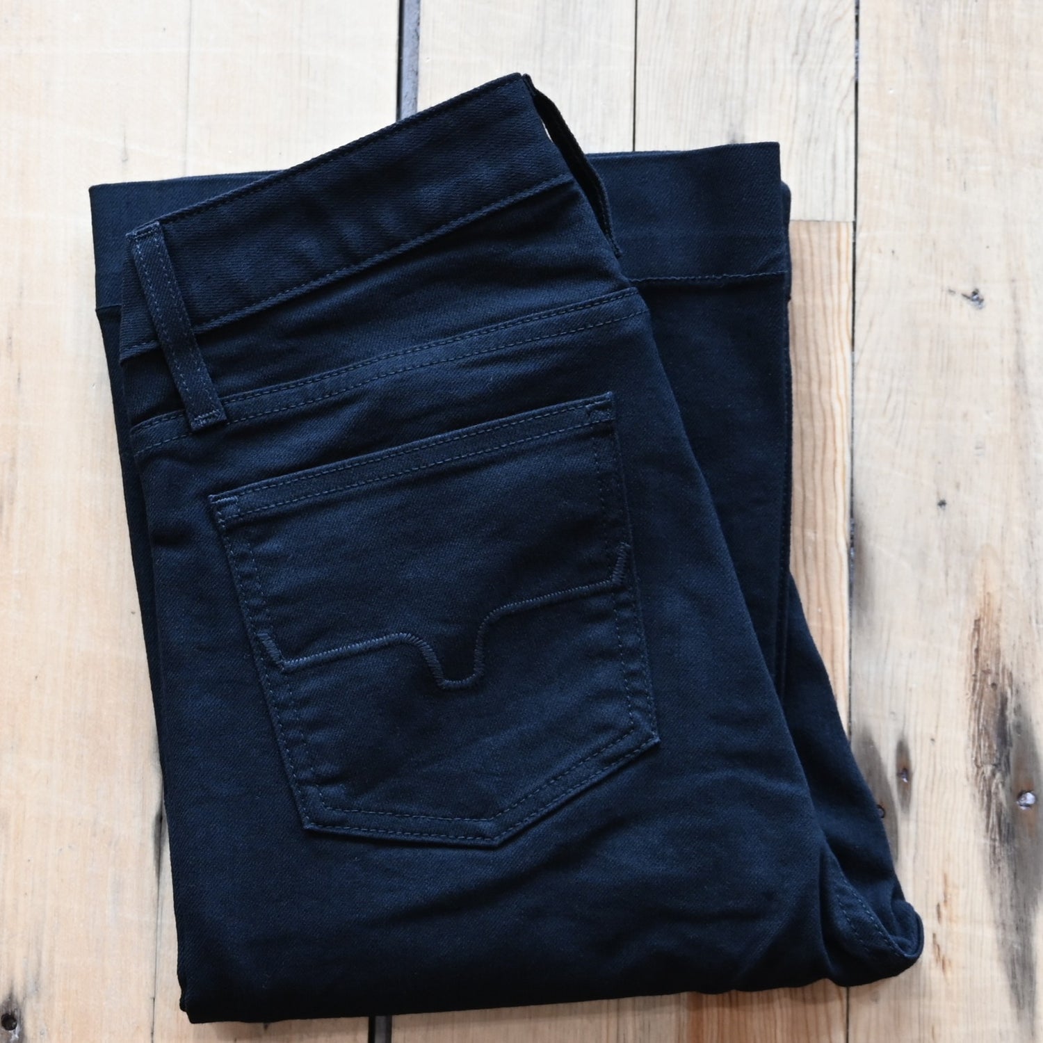 View of Kimes Ranch Jennifer Jeans in Black, showcasing ultra high rise and super wide flare leg