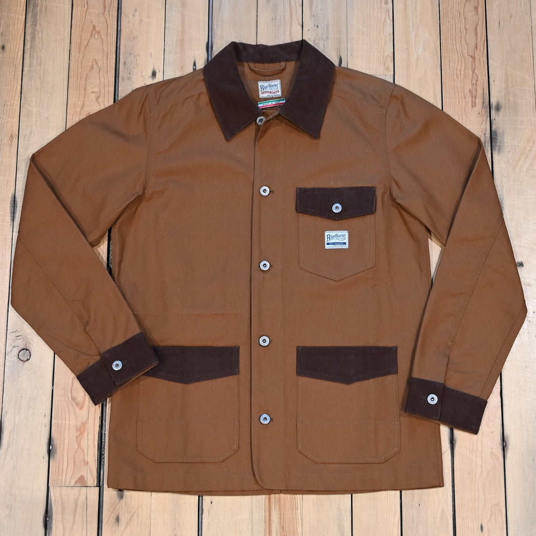 Blue Blanket Miner Jacket in Italian duck canvas with flap pockets and brown corduroy details