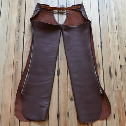 View of Weaver Shotgun Full Grain Chaps in brown oil-tanned leather with adjustable closures