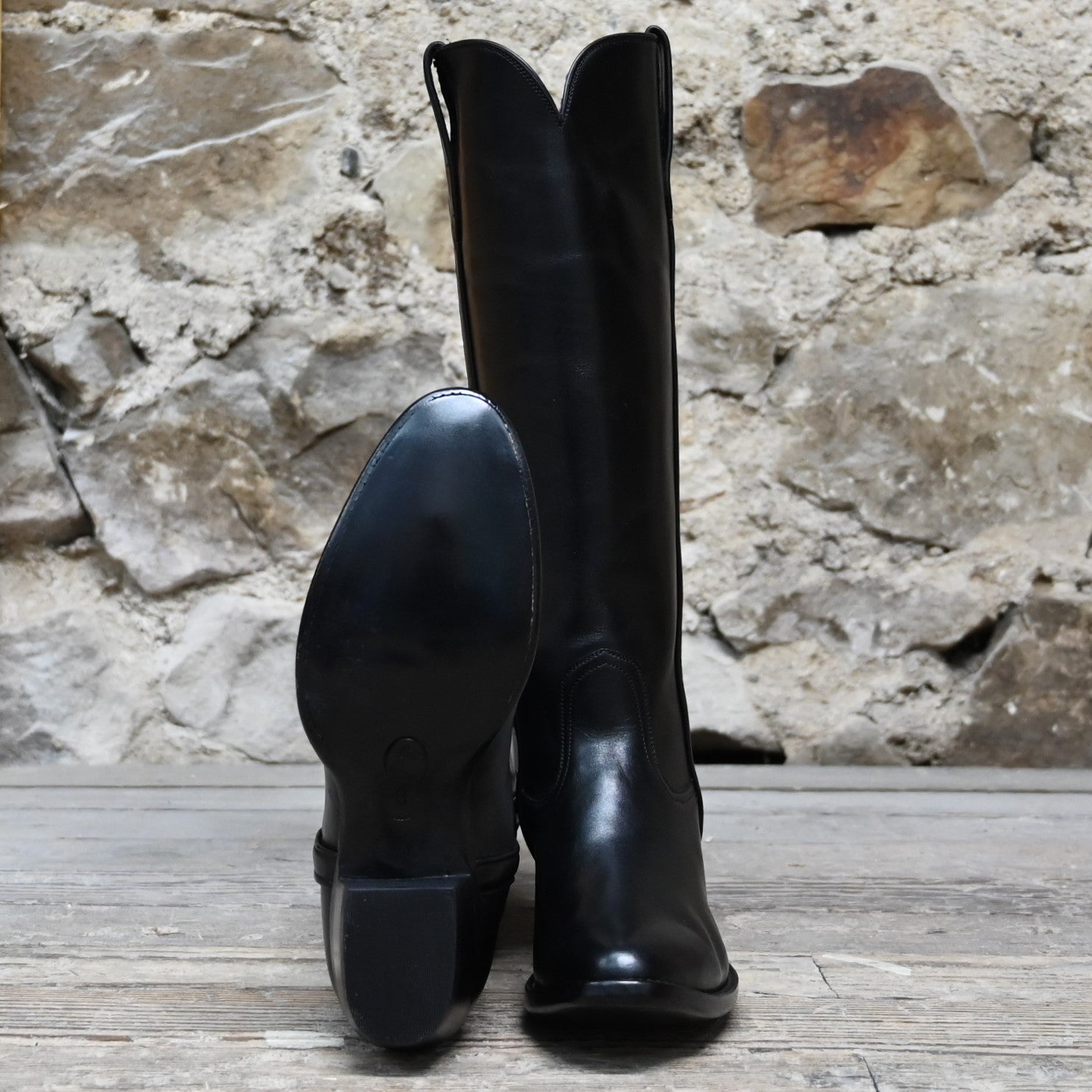 View of Stallion Ladies 16&quot; boots showcasing black French calf vamp and top with B toe and leather stacked heel