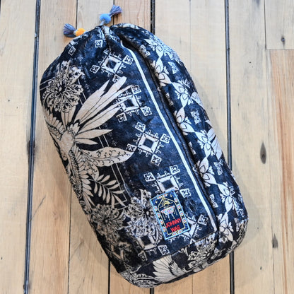 View of Johnny Was Laurel Canyon Cozy Blanket in Myna Scarf Print with tassel pouch