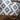 Myra Blue Sapphire printed canvas shoulder bag with leather trim and zipper closure