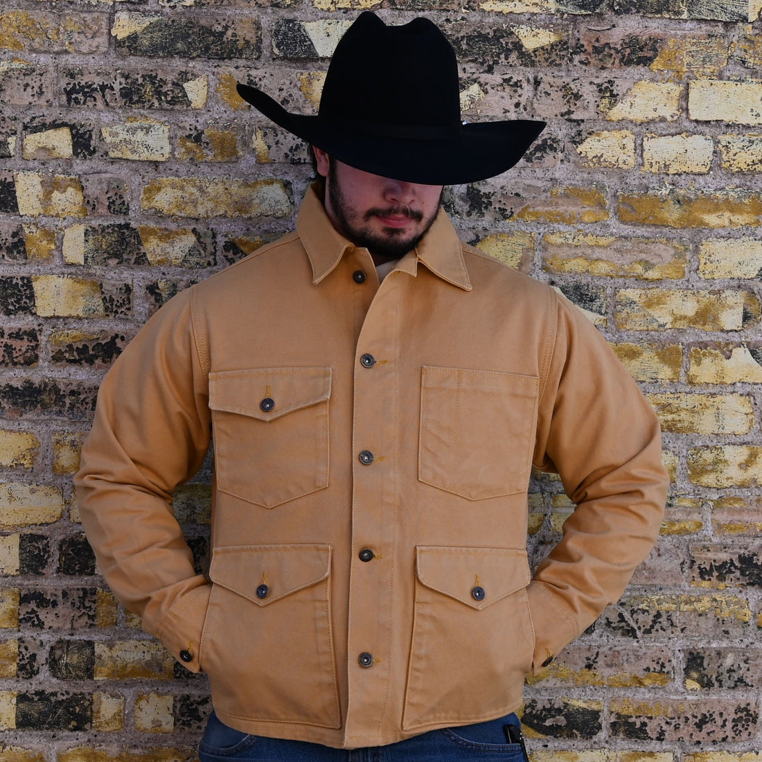 View of Schaefer Brushcloth jacket in suntan with antique brass buttons and six-pocket design
