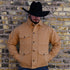 View of Schaefer Brushcloth jacket in suntan with antique brass buttons and six-pocket design