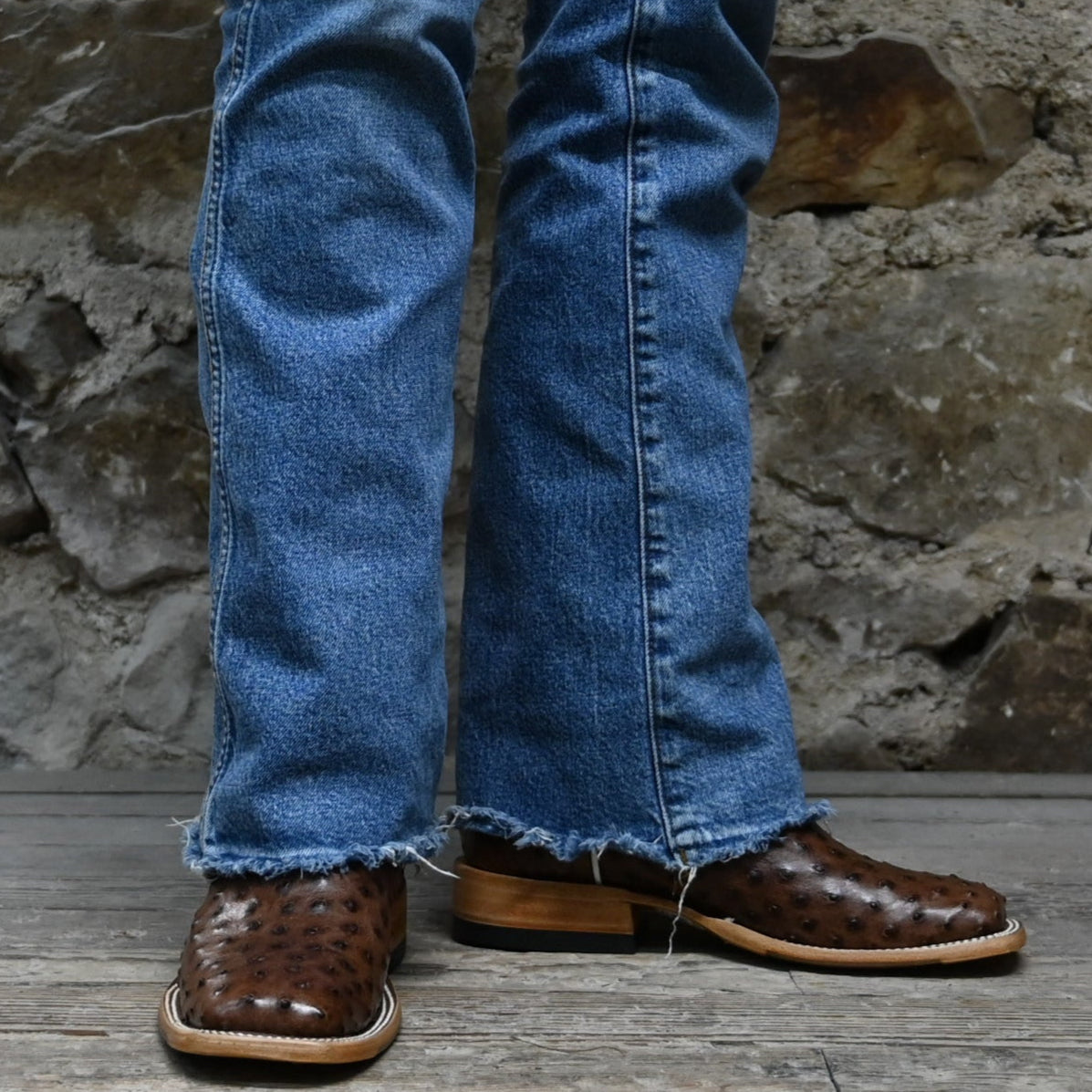 View of Macie Bean 12″ boot in sky blue shaft with Kango tobacco ostrich vamp, almond toe and cowgirl heel