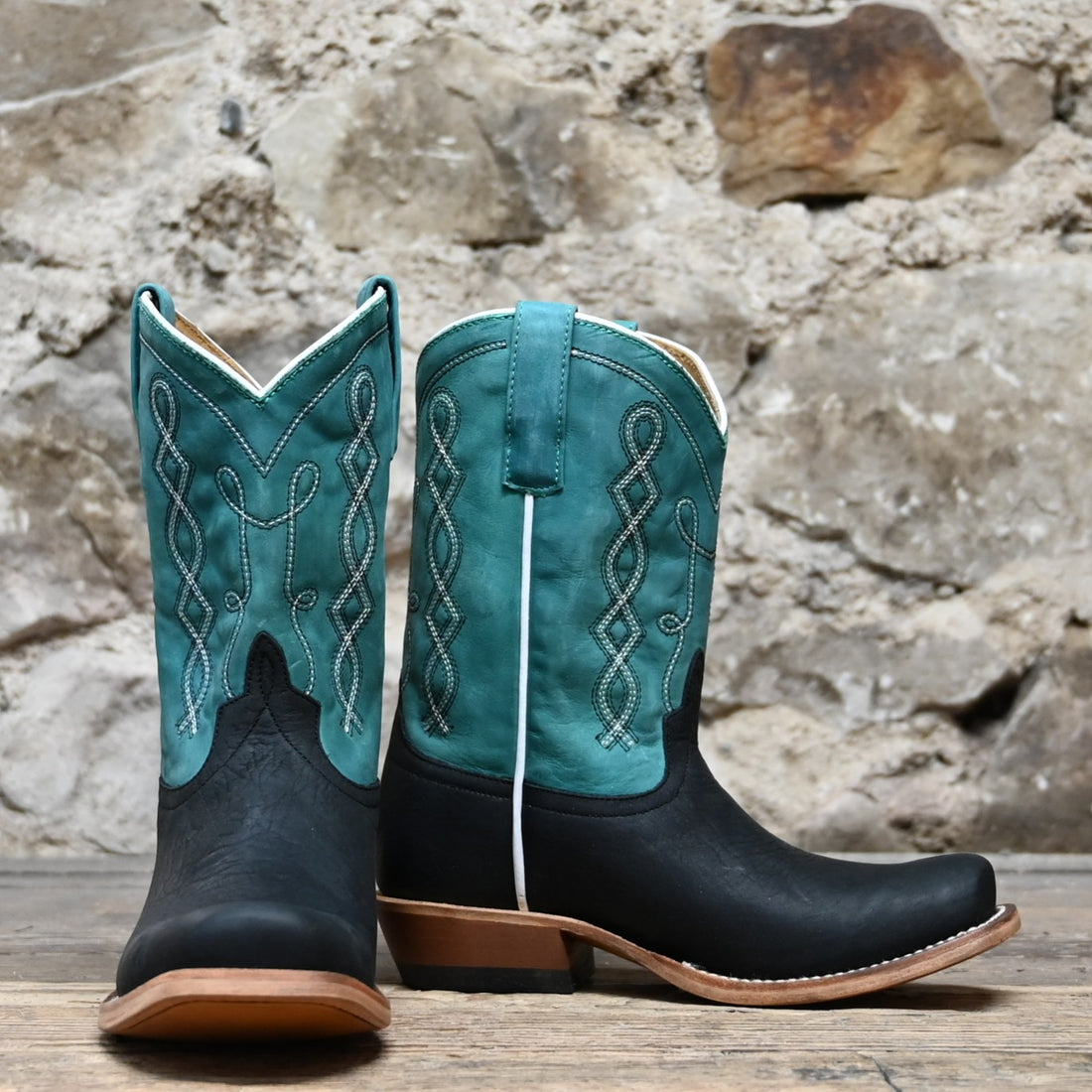 View of Anderson Bean Kids cowboy boot with black oiled shoulder vamp and sea foam leather top