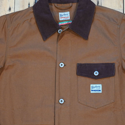 Blue Blanket Miner Jacket in Italian duck canvas with flap pockets and brown corduroy details