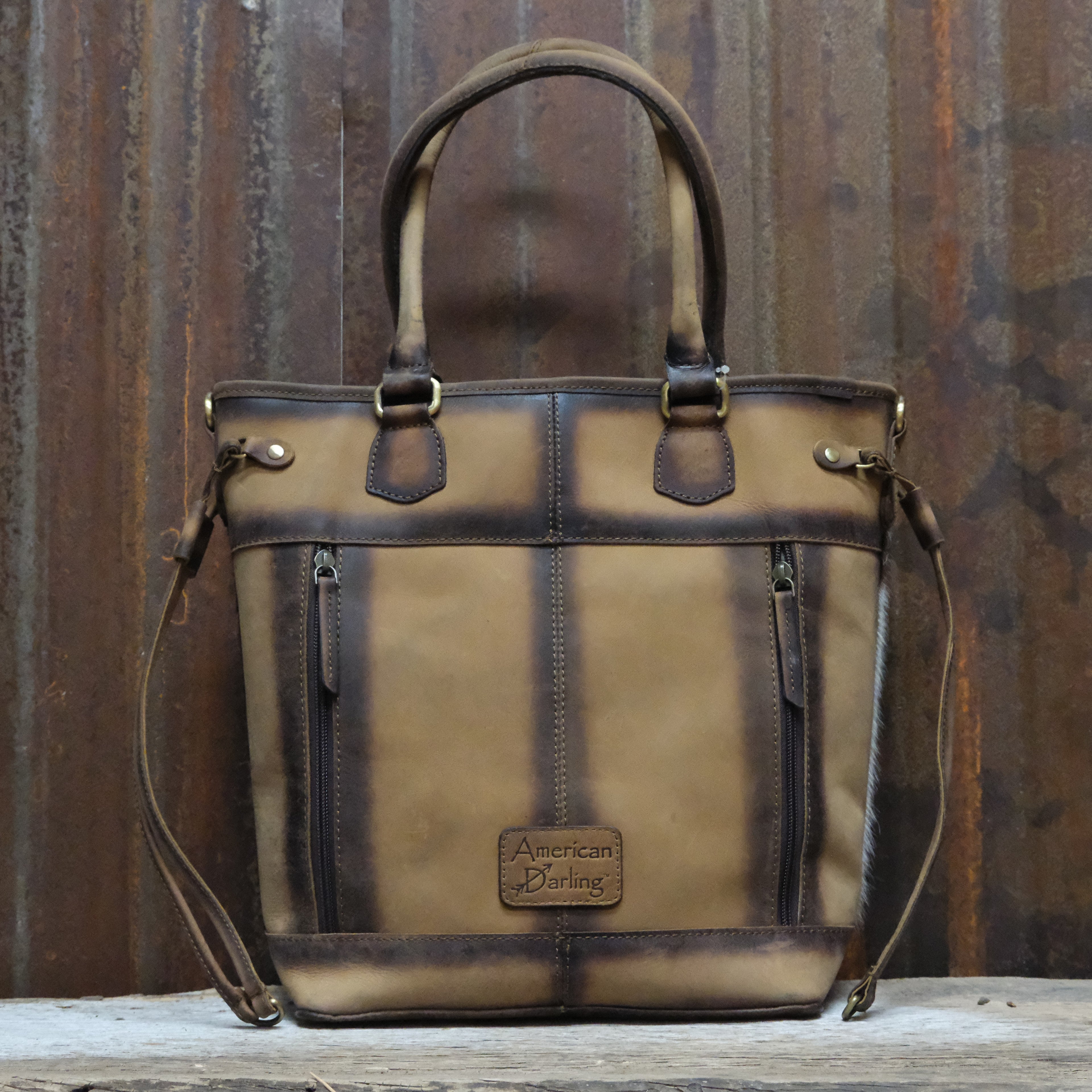 American Darling hair on brown and white conceal carry tote bag with canvas back and leather straps