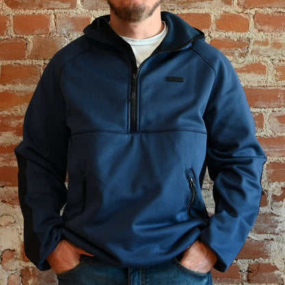 View of Filson Granite Spire Fleece Pullover in Service Blue featuring Cordura® nylon-reinforced forearms and microfleece-lined handwarmer pockets