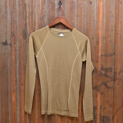 View of Filson Ladies 280g Merino Long Sleeve Crew in Rugged Tan, showcasing its soft merino wool fabric for warmth and comfort
