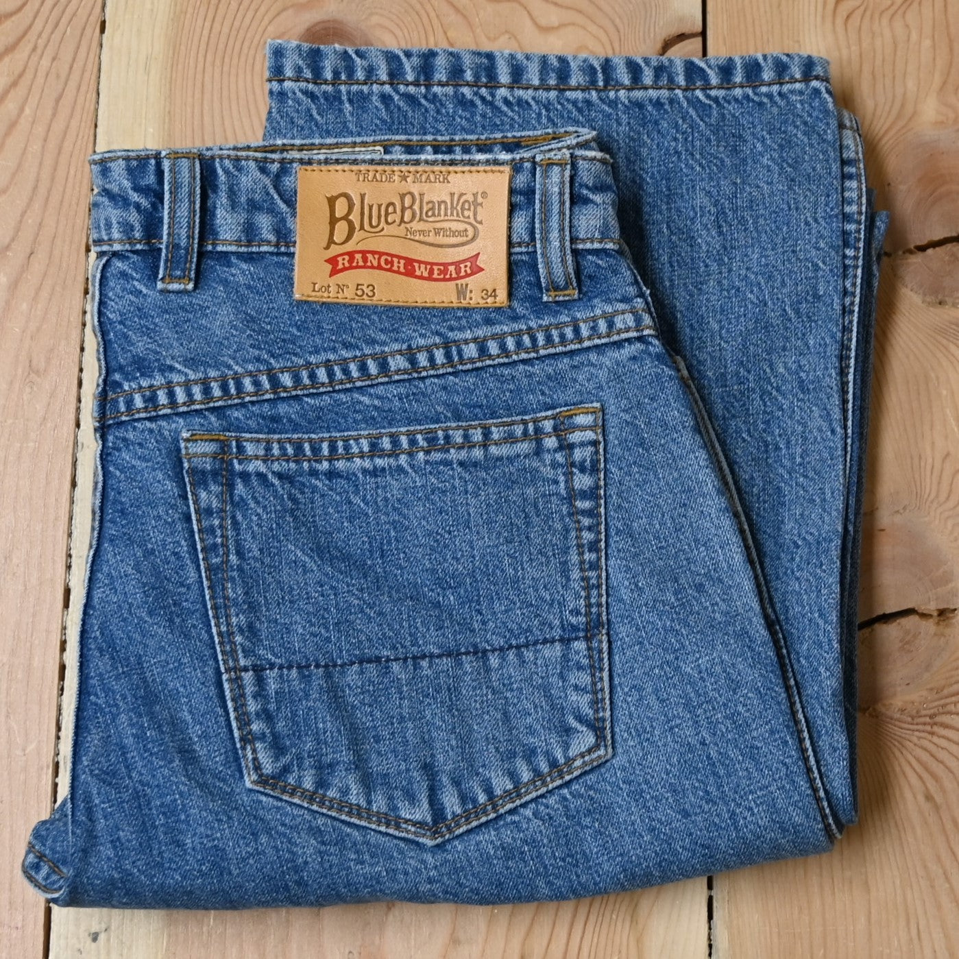 View of Blue Blanket ladies light indigo denim jeans with straight-leg silhouette and tailored waist