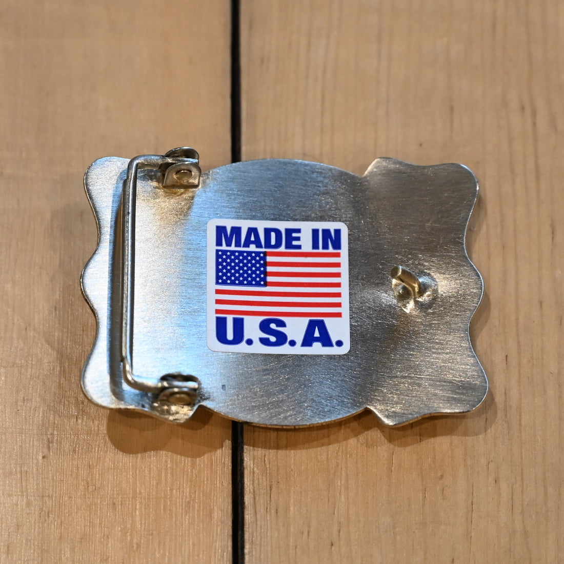 Rockmount belt buckle with “End of the Trail” relief design of rider and horse