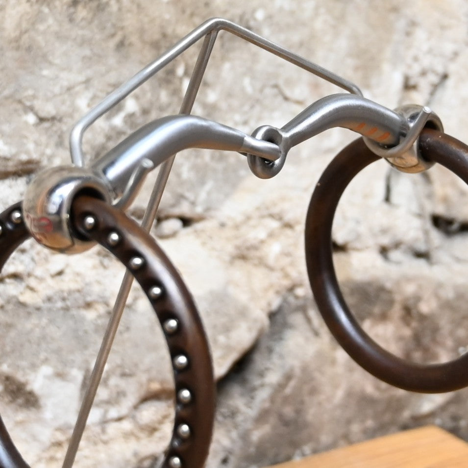 Tom Balding Divots &amp; Dots Loose Ring Snaffle with sweet iron mouth and brown engraved rings.
