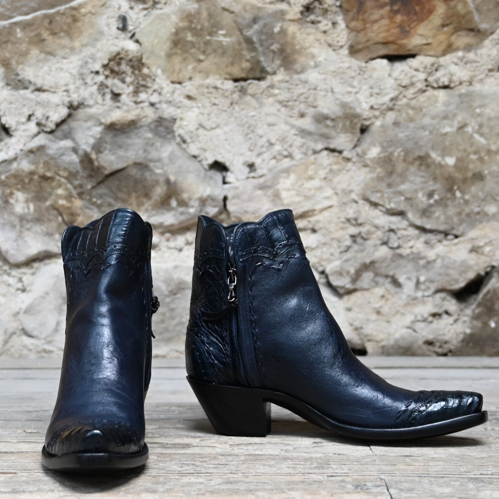 View of Stallion Ladies Zorro zip boot in dark navy Italian calf with caiman wingtip and pointed snip toe
