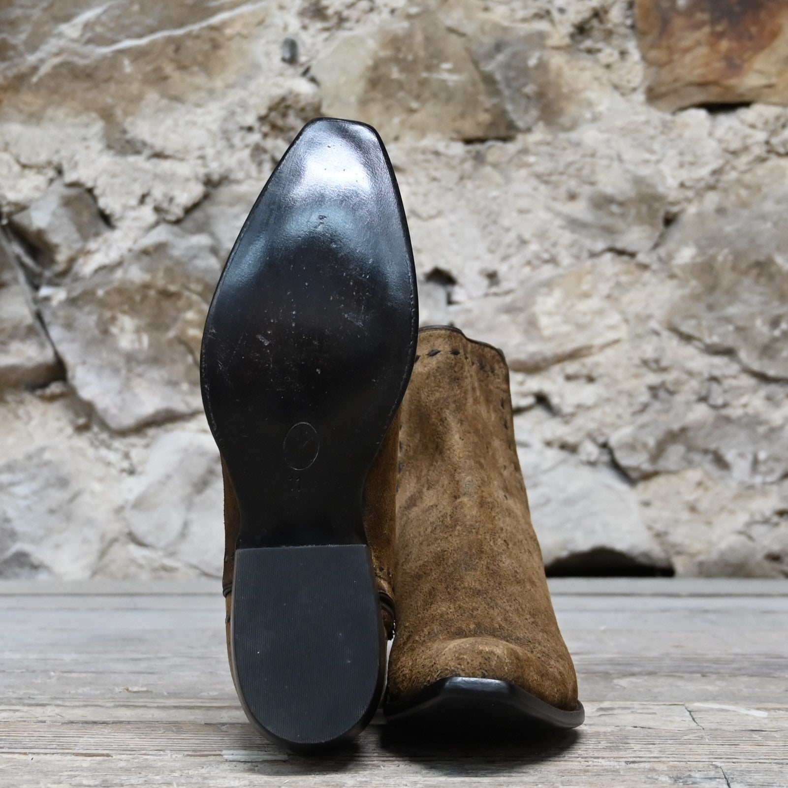 View of Stallion snip‑toe ankle boot in distressed camel kid with chocolate buckstitching and side zipper