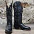View of Hondo 16" cowboy boot with black retan vamp, natural lined top, flourished stitching, and spur ledge