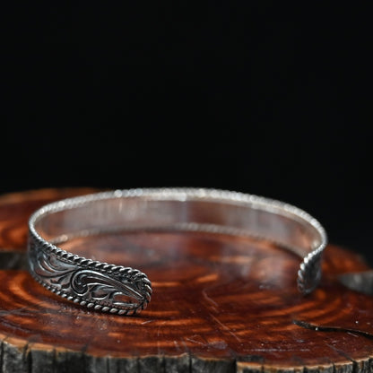 Vogt Clara Daytime Cuff — slim engraved sterling silver adjustable bracelet with rope-edge