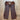 View of Weaver Shotgun Full Grain Chaps in brown oil-tanned leather with adjustable closures.
