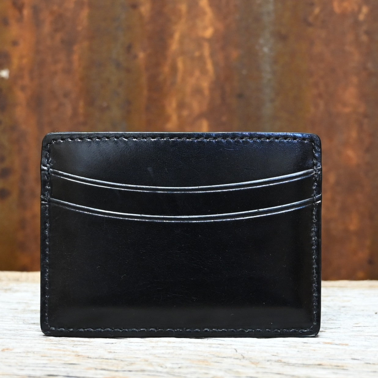 Lucchese black leather credit card case with contrast stitching in slim flat design