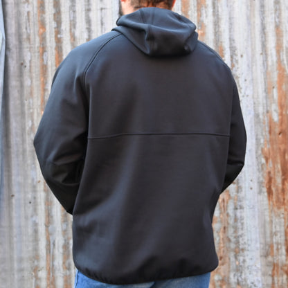 View of Filson Granite Spire Fleece Pullover in Black featuring Cordura® nylon-reinforced forearms and microfleece-lined handwarmer pockets