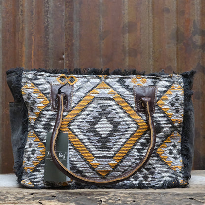 Myra Orange Affairs printed canvas small crossbody bag with leather trim and adjustable strap