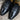 View of Hyer NANETTE 9" boots showcasing black cowhide vamp and sunflower vintage goat top with butterfly inlay, fashion snip toe, and leather stacked heel