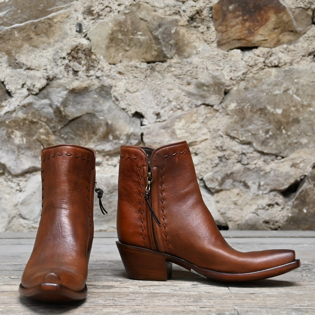 View of Stallion Ladies Zorro zip boot in cognac calf with buckstitching and X 5/8" toe