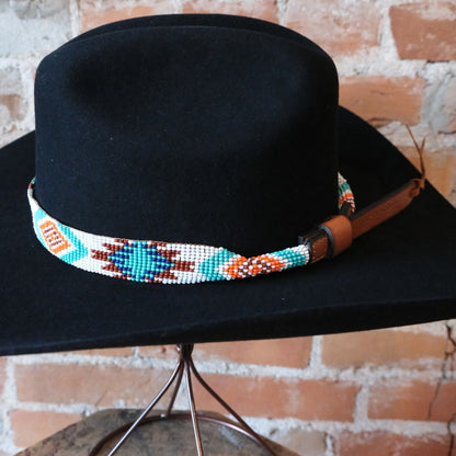Sambboho Aztec beaded leather hatband with vibrant red, white, and turquoise native geometric patterns.