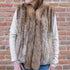 Morris Kaye natural rabbit fur vest with raccoon trim