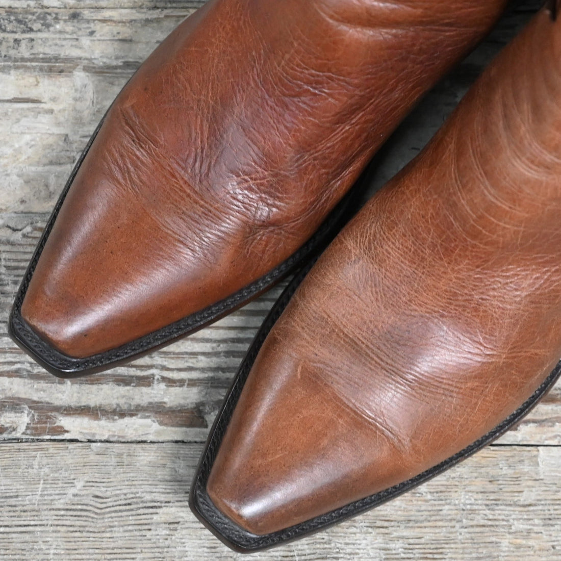 View of Stallion Men’s Zorro zip boot in cognac calf with buckstitching and snip toe